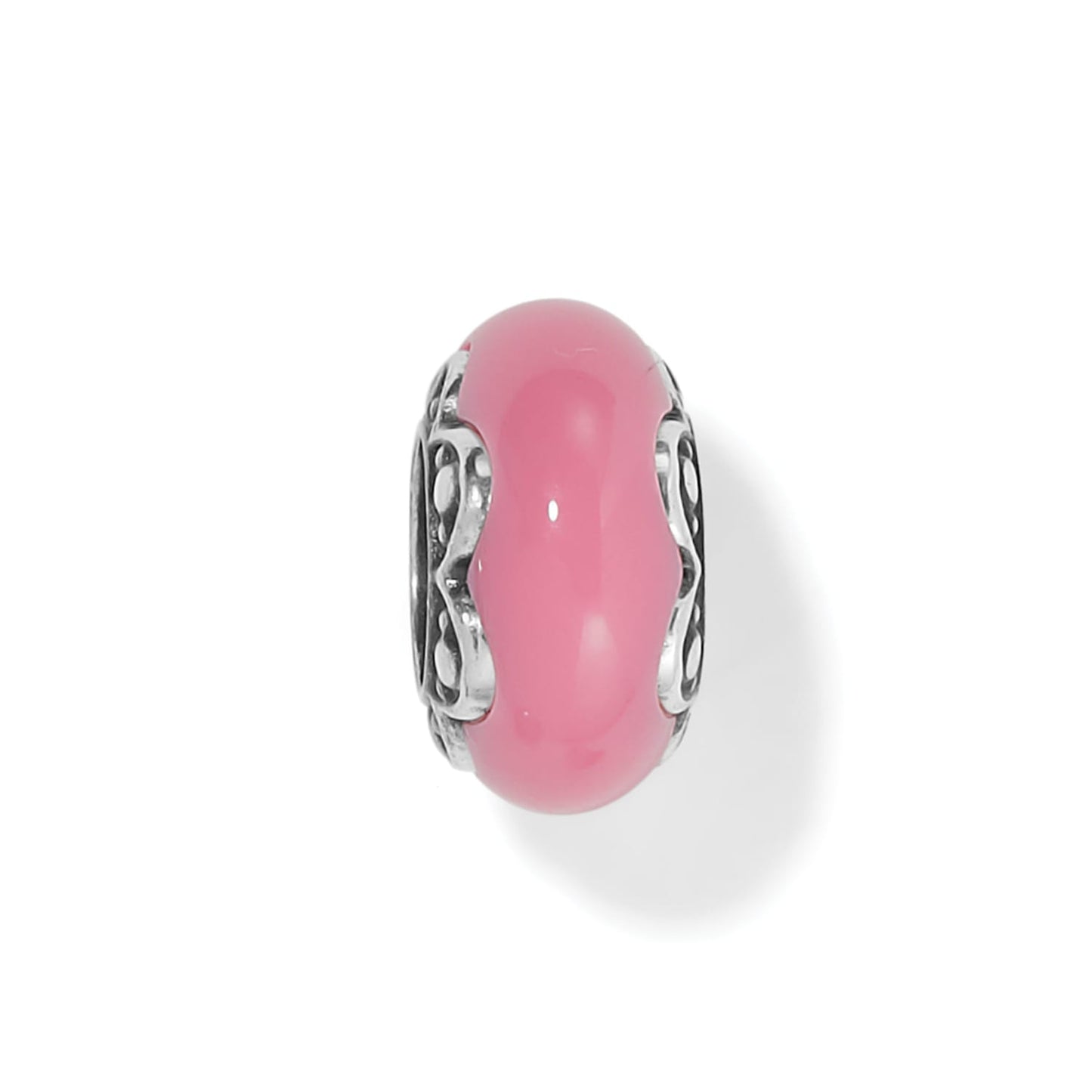 Brighton charm bead with pink glass center and ornate silver-tone scrollwork sides on a white background