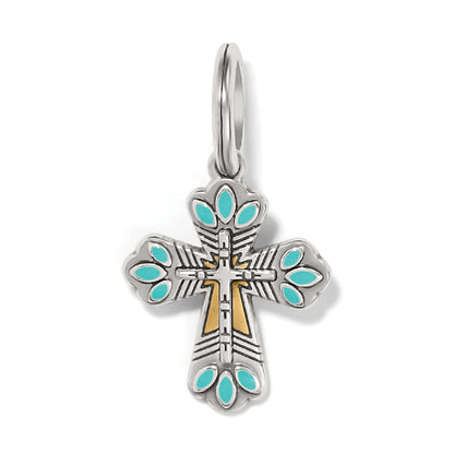 Brighton cross charm with turquoise enamel accents, silver-plated frame, and gold-plated inner cross on a white background
