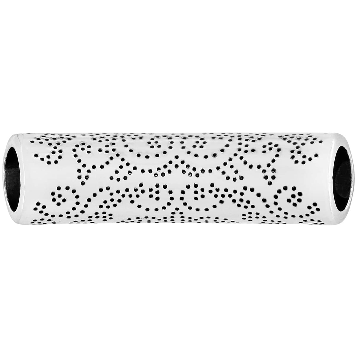 Brighton silver-plated tubular bead with perforated floral scroll pattern and open ends on a white background