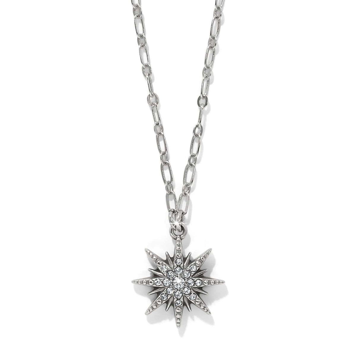Brighton pendant necklace with silver-plated starburst featuring crystal accents on a paperclip-style chain on a white background