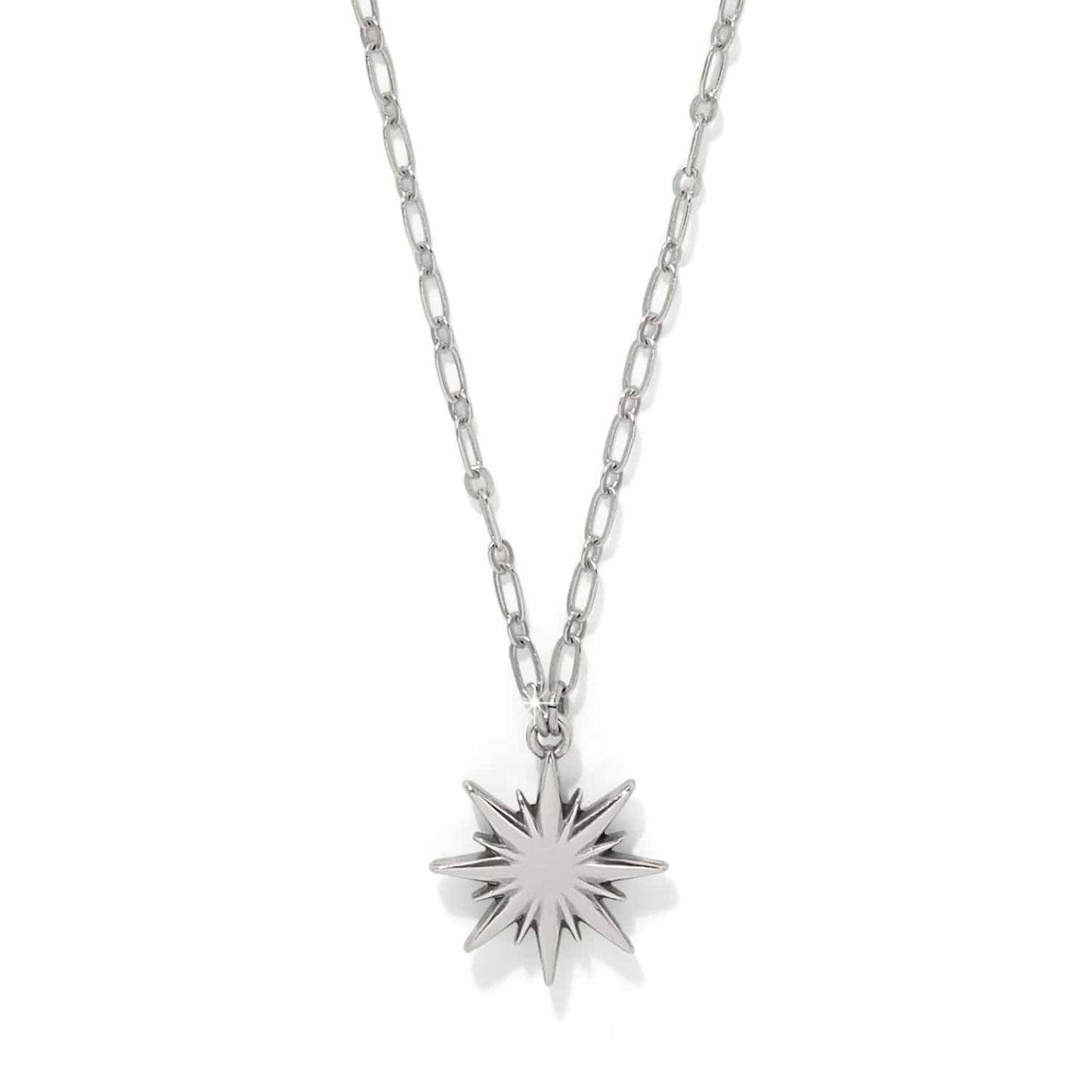 Brighton pendant necklace with silver-plated starburst charm and link chain on a white background