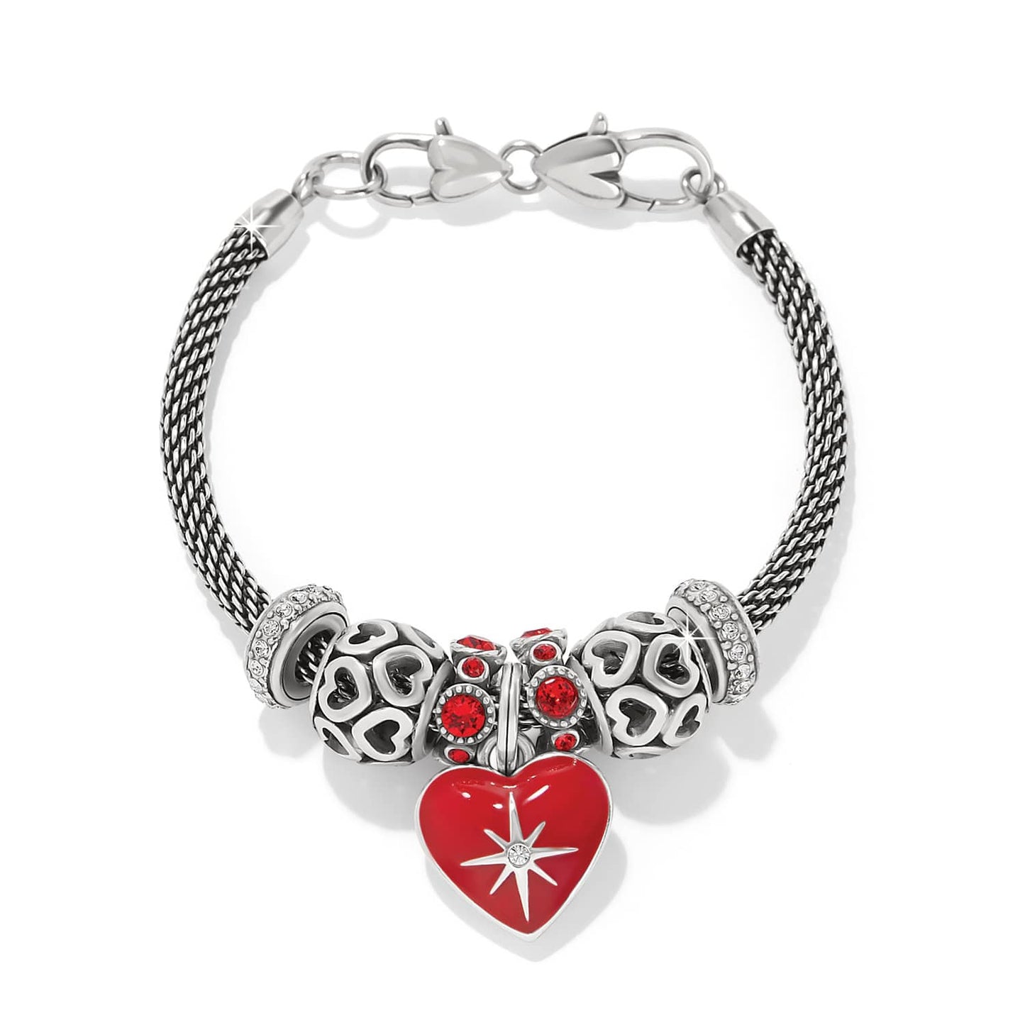 Brighton silver-plated charm bracelet with red enamel heart pendant, crystal beads, and heart-patterned charms on a white background
