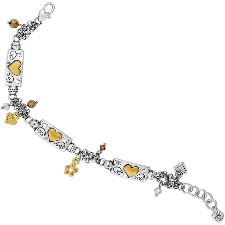 Brighton charm bracelet with silver-plated heart stations, brushed gold hearts, crystal accents, and dangling charms on a white background