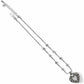 Brighton silver-plated pendant necklace with ornate scrollwork heart, crystal pavé accents, and beaded chain on a white background