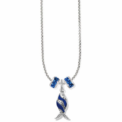 Brighton silver-plated pendant necklace with blue fish charm and two blue crystal beaded accents on a white background