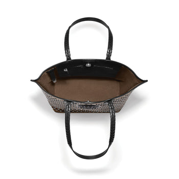 Brighton handbag interior view with brown lining, black trim, zippered pocket, and braided leather handles on a white background