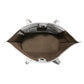 Brighton handbag interior view showing white leather lining, brown suede base, and snap closure on a white background