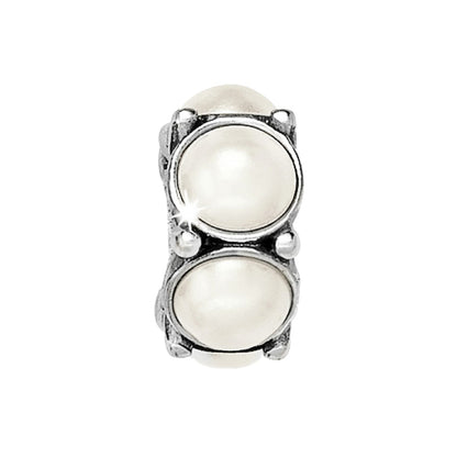 Brighton spacer charm with two round white pearls set in silver-plated frame with beaded accents on a white background