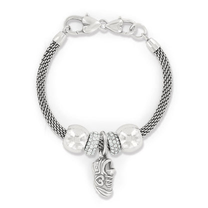 Brighton charm bracelet with silver-plated mesh chain, crystal beads, and sneaker charm on a white background
