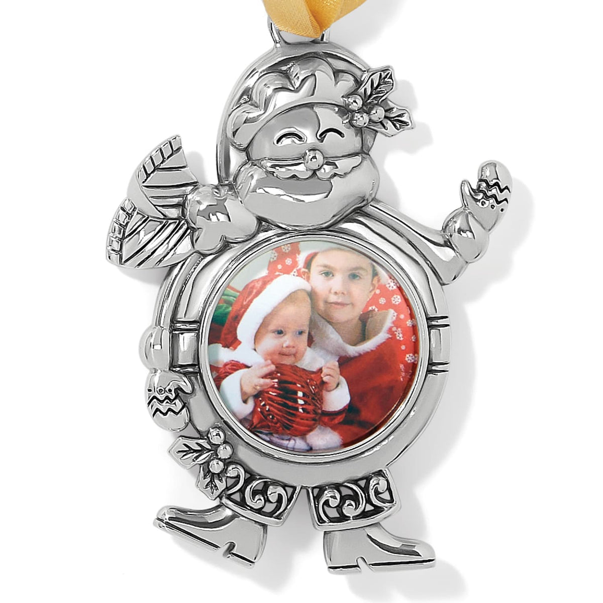 Brighton silver-plated snowman ornament with holly accents and circular photo frame holding a children's picture on a white background