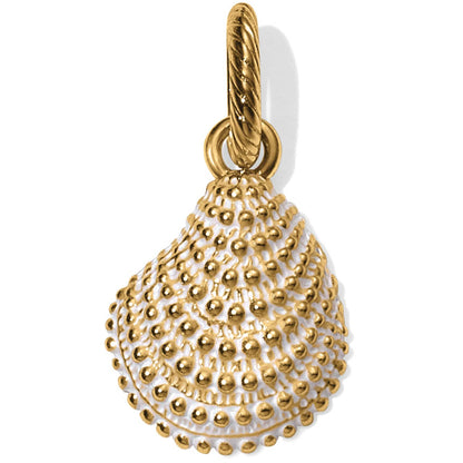 Brighton shell charm with gold-plated beaded texture and white enamel accents on a white background