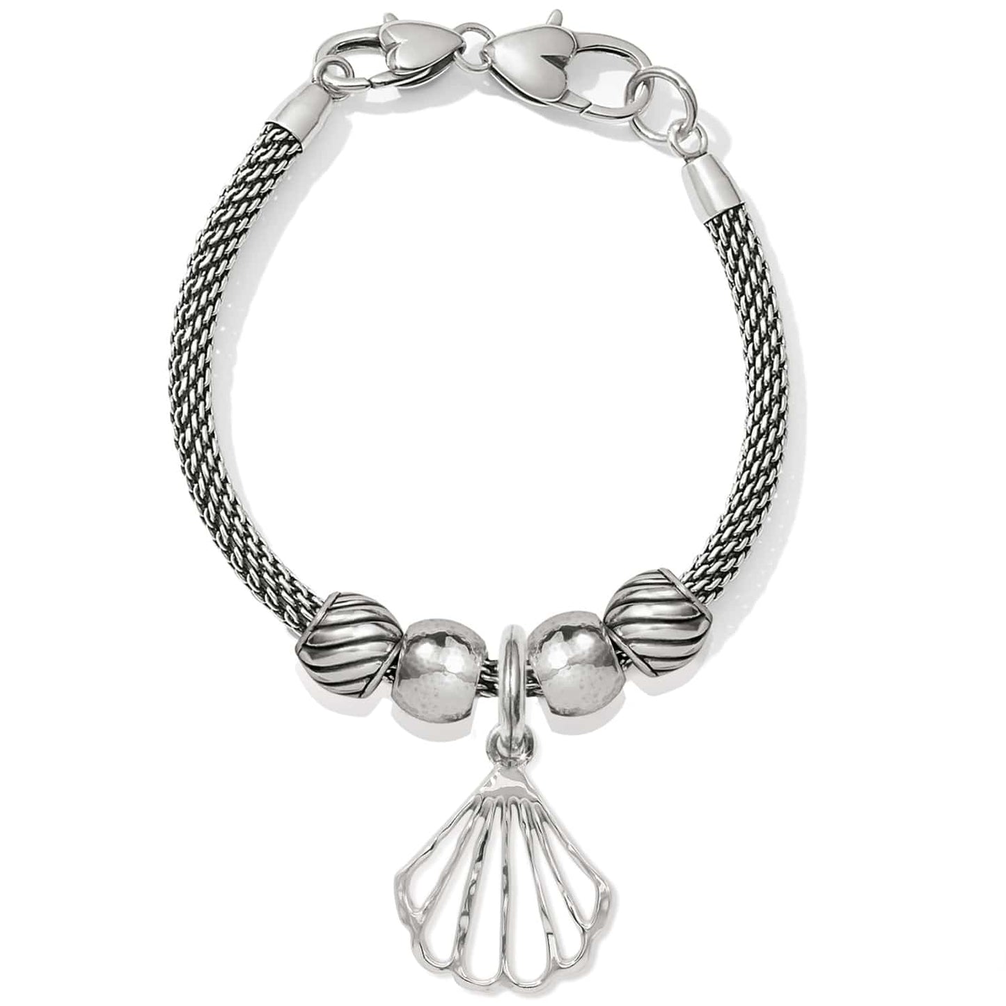 Brighton charm bracelet with silver-plated mesh chain, beaded accents, and openwork seashell charm on a white background