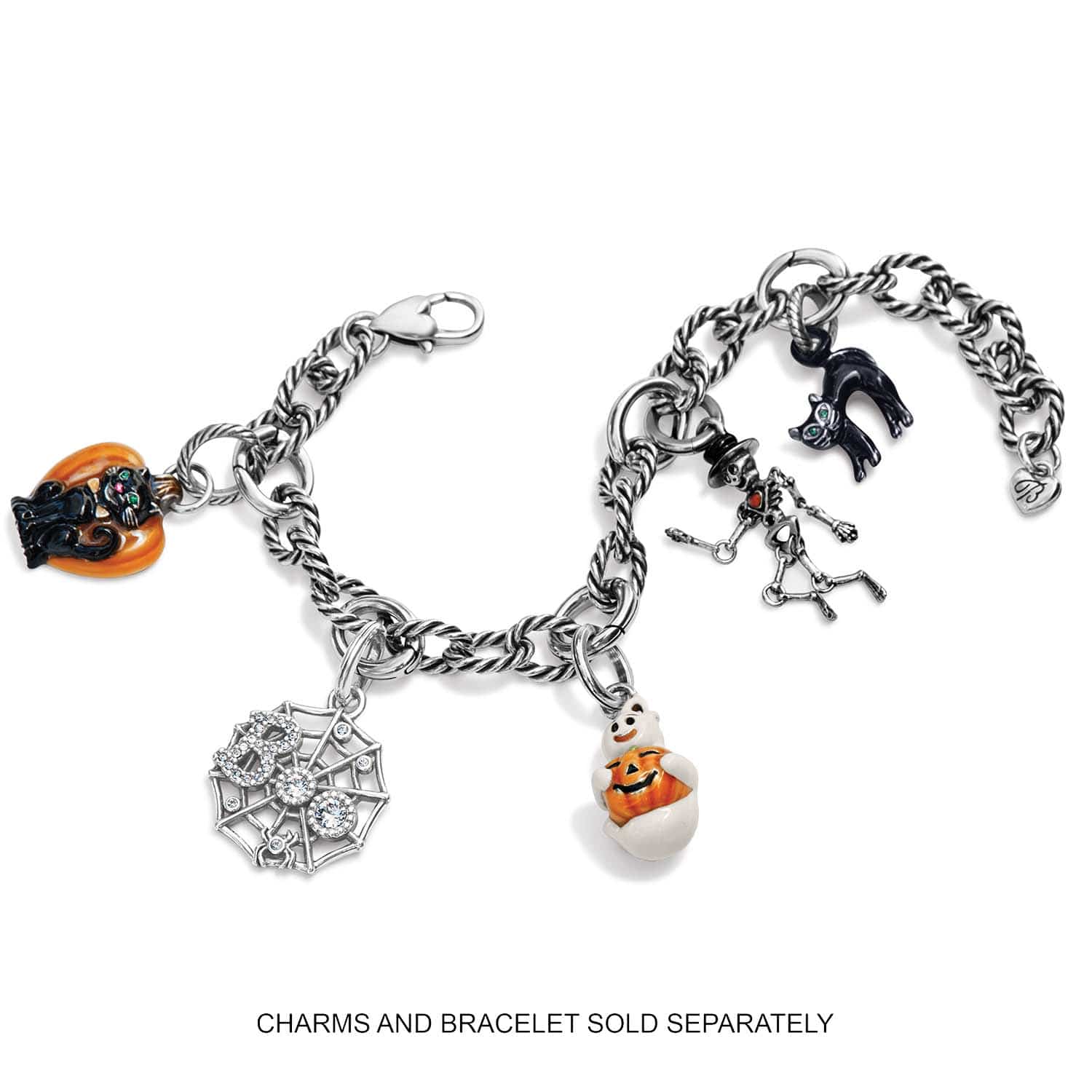 Brighton silver-plated charm bracelet with Halloween-themed cat, spider web, ghost, pumpkin, and skeleton charms on a white background