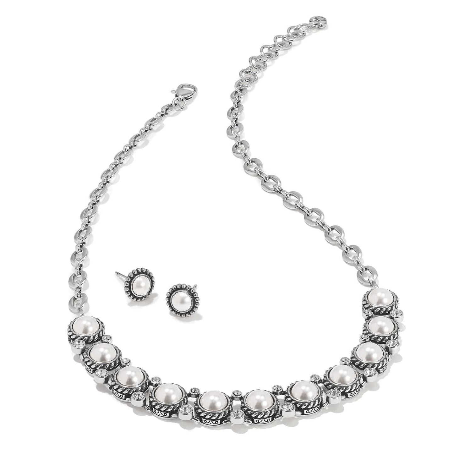 Brighton silver-plated necklace and stud earrings set with glass pearls and crystal accents on a white background
