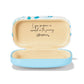 Brighton sunglasses case shown open with tan interior, inspirational quote, and light blue exterior on a white background
