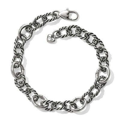 Brighton link bracelet with silver-plated twisted rope oval links, heart charm, and lobster clasp on a white background