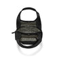 Brighton black leather handbag shown open from above revealing patterned interior lining and zippered compartment on a white background
