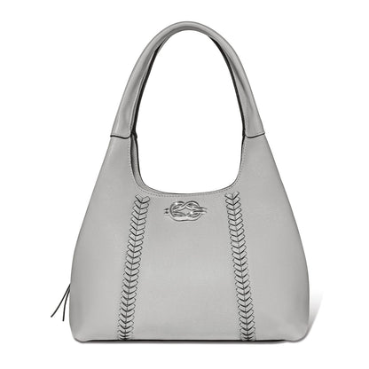 Brighton handbag in gray pebbled leather with braided accents, silver-tone logo emblem, and rounded top handle on a white background