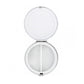 Brighton round pill case shown open with mirrored lid and two-compartment white interior on a white background
