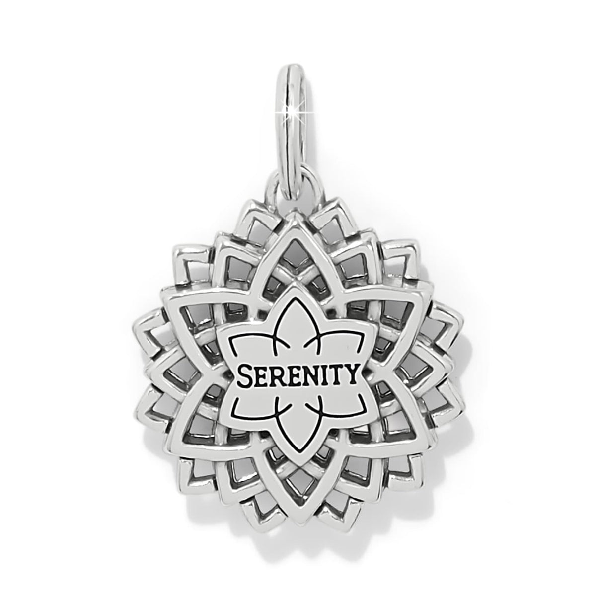 Brighton charm shown from the back with silver-plated lotus design and engraved Serenity inscription on a white background
