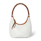Brighton white leather shoulder handbag with braided brown leather handle and silver-tone scrollwork accents on a white background