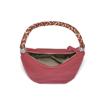 Brighton pink leather handbag shown open with braided multicolor handle and patterned interior lining on a white background