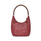 Brighton burgundy leather hobo handbag with braided multicolor top handle and silver-tone scroll accents on a white background