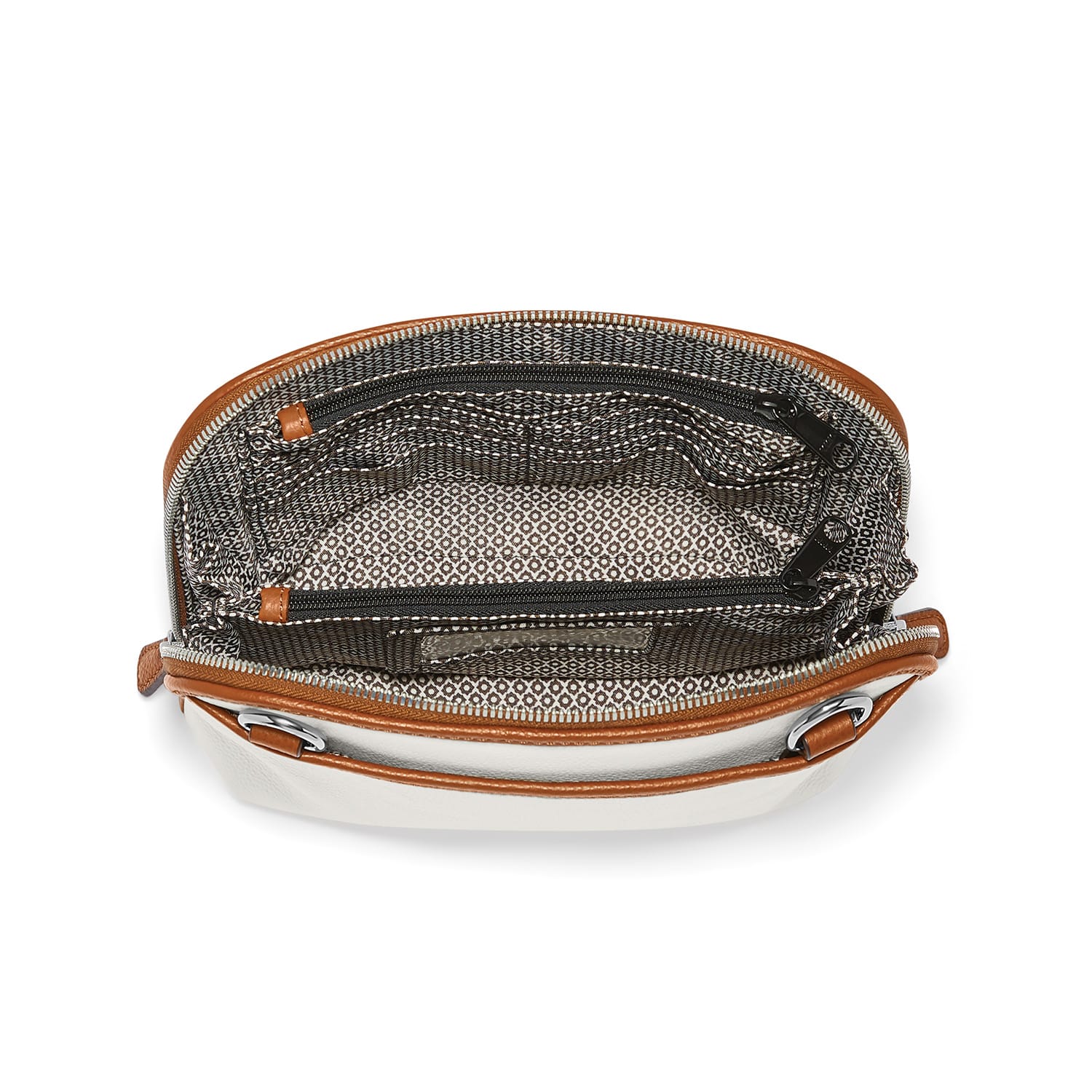 Brighton handbag interior view showing patterned fabric lining, zippered pockets, and tan leather trim on a white background