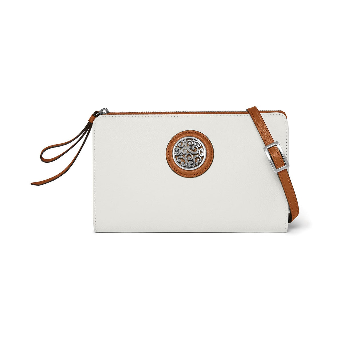 Brighton crossbody wristlet in white with tan trim, silver-tone medallion accent, and adjustable strap on a white background