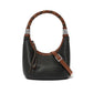 Brighton hobo handbag in black pebbled leather with braided brown handle, silver-tone accents, and adjustable strap on a white background
