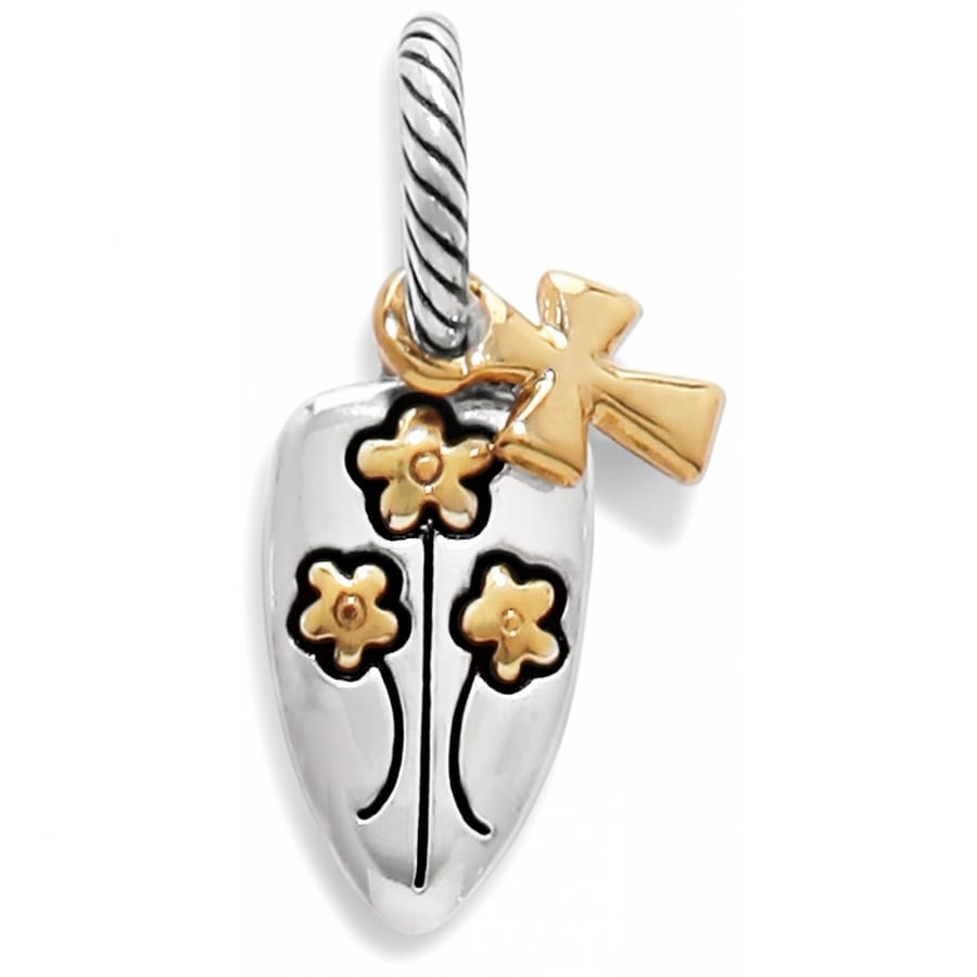 Brighton charm shaped like a garden trowel with gold-tone flowers and cross accent on a white background