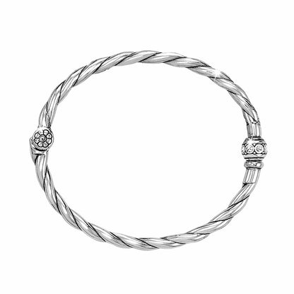 Brighton twisted rope bangle bracelet with silver-plated flower and crystal bead accents on a white background