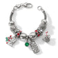Brighton charm bracelet with silver-plated beads, red and green crystals, candy cane, and Blessed charm on a white background
