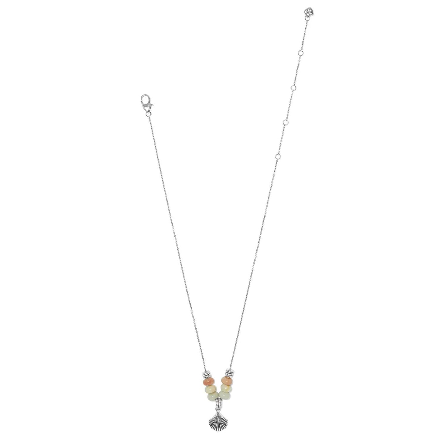 Brighton silver-plated necklace with peach and pale green beads and shell pendant on a white background