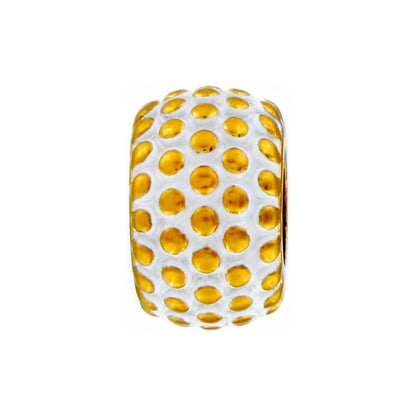 Brighton bead charm with gold-tone dotted texture and white enamel accents in a rounded shape on a white background