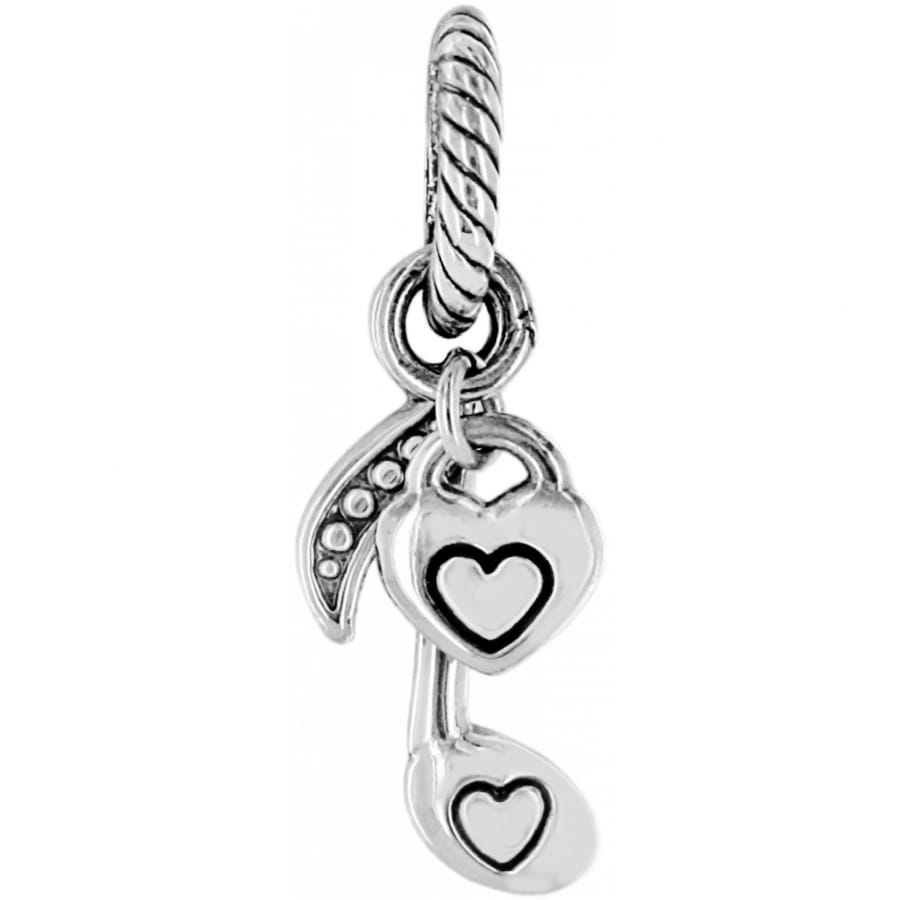 Brighton dangle charm with silver-plated heart lock and heart-engraved teardrop on twisted rope bail on a white background