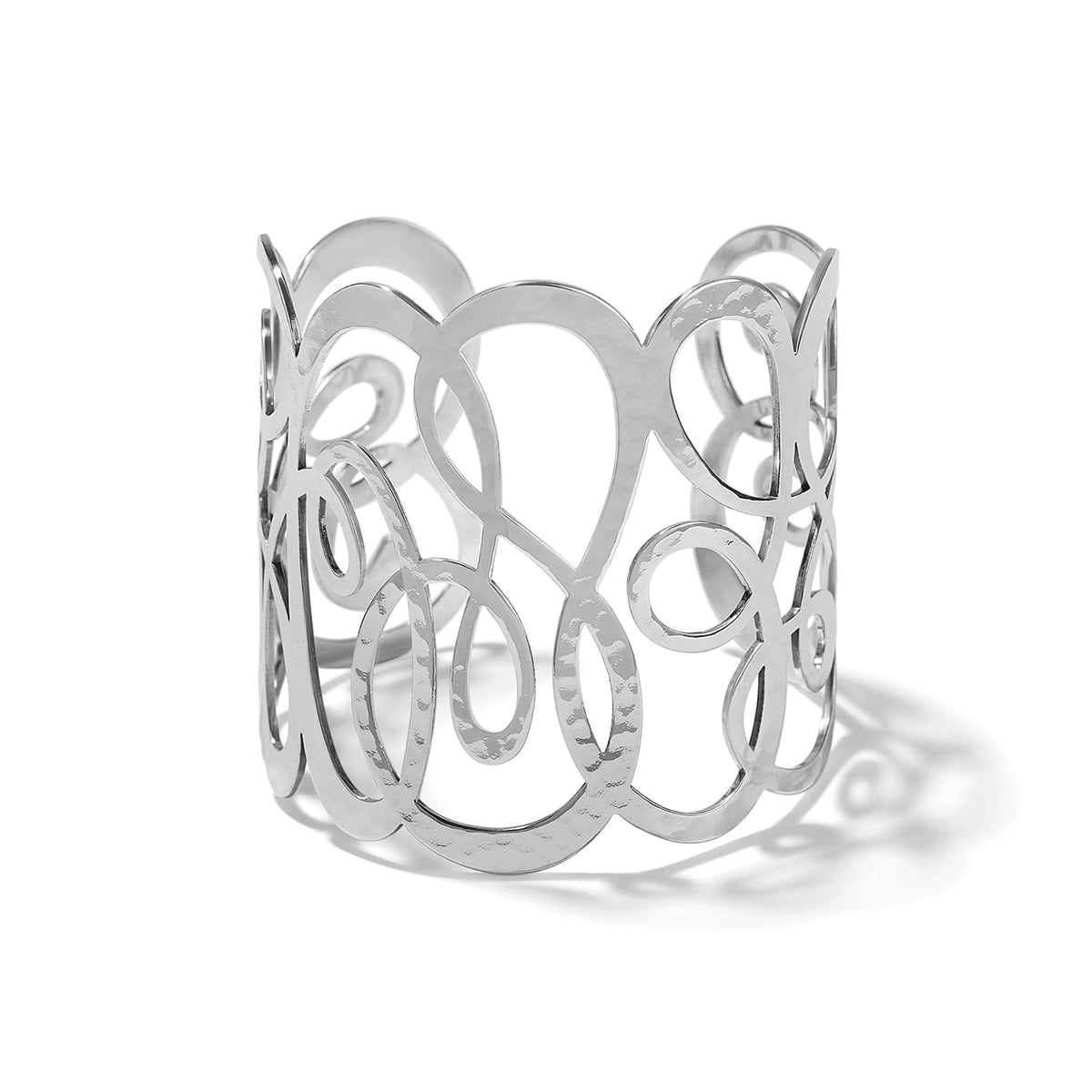 Brighton wide cuff bracelet with silver-plated hammered swirling openwork loop design on a white background
