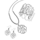 Brighton silver-plated jewelry set styled with hammered scroll pendant necklace, matching drop earrings, and cuff bracelet