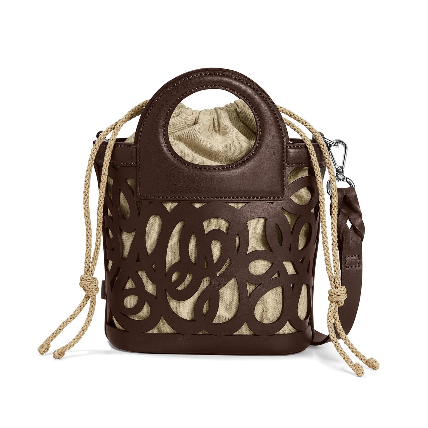 Brighton handbag in brown leather with cutout swirl design, beige drawstring lining, and rope straps on a white background