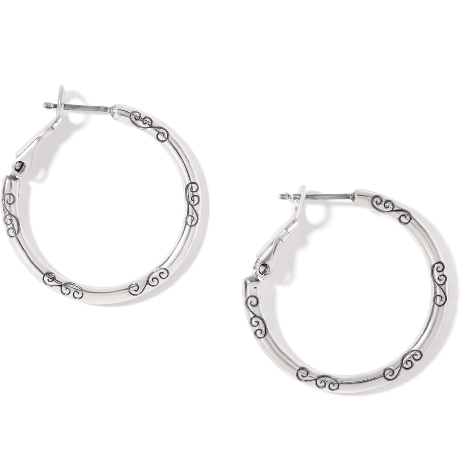 Brighton hoop earrings in silver-tone finish with engraved scroll detailing along the bands on a white background