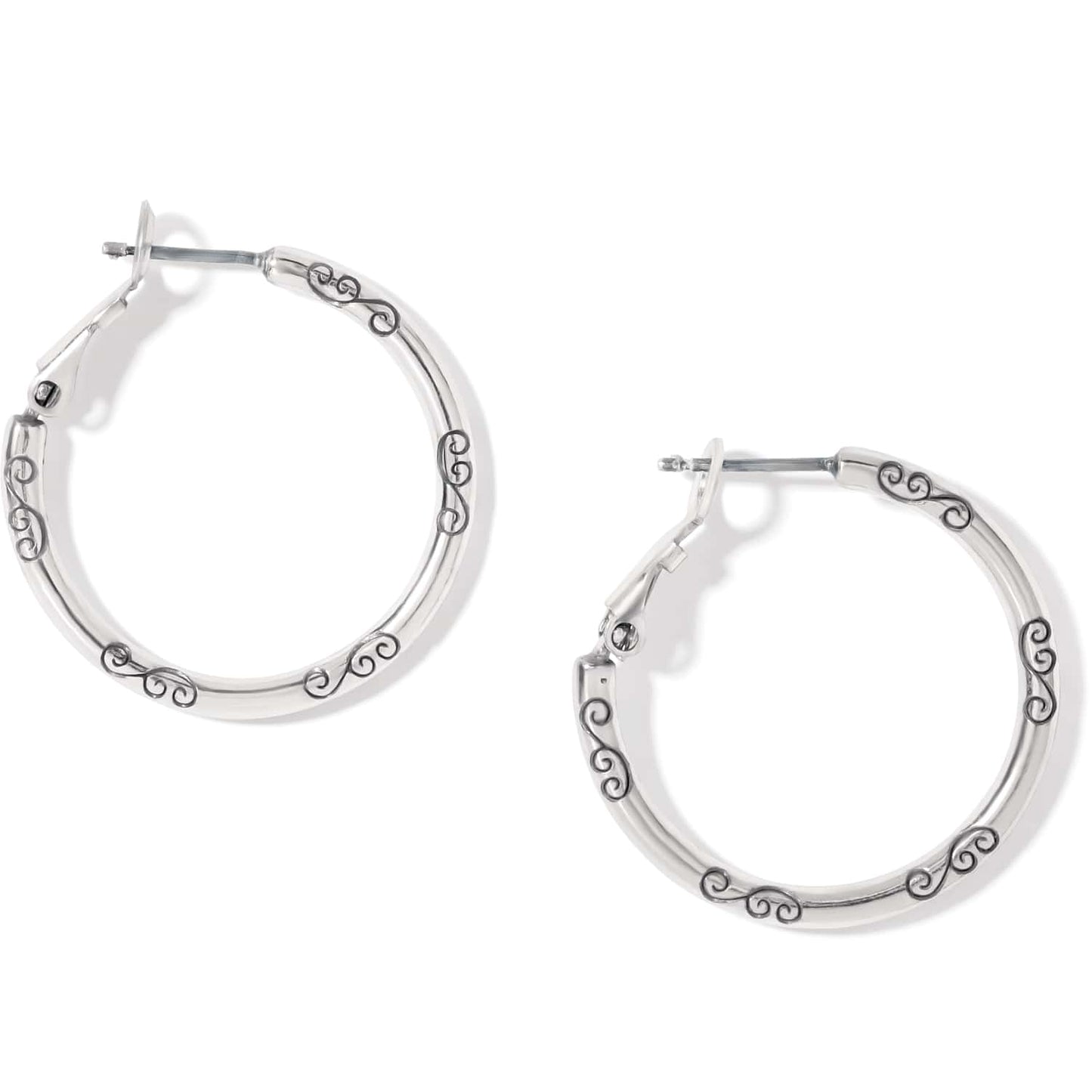 Brighton hoop earrings in silver-tone finish with engraved scroll detailing along the bands on a white background