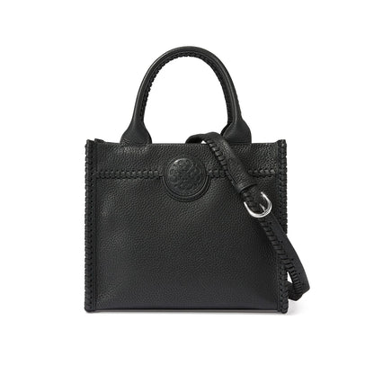 Brighton black pebbled leather tote handbag with whipstitched edges, medallion emblem, and adjustable crossbody strap on a white background
