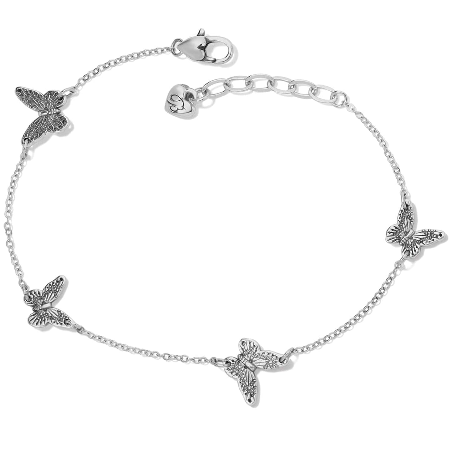 Brighton silver-plated chain bracelet with four butterfly stations, heart charm, and lobster clasp on a white background