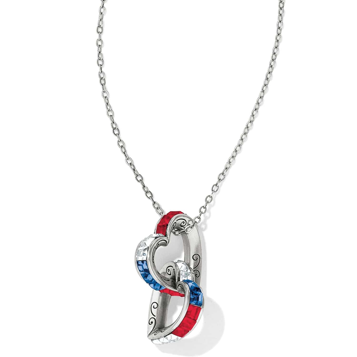 Brighton pendant necklace with silver-plated interlocking hearts and red, blue, and clear crystals on a white background