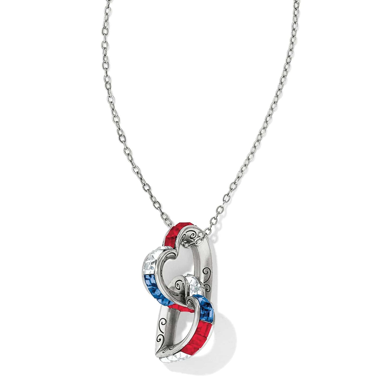 Brighton pendant necklace with silver-plated interlocking hearts and red, blue, and clear crystals on a white background