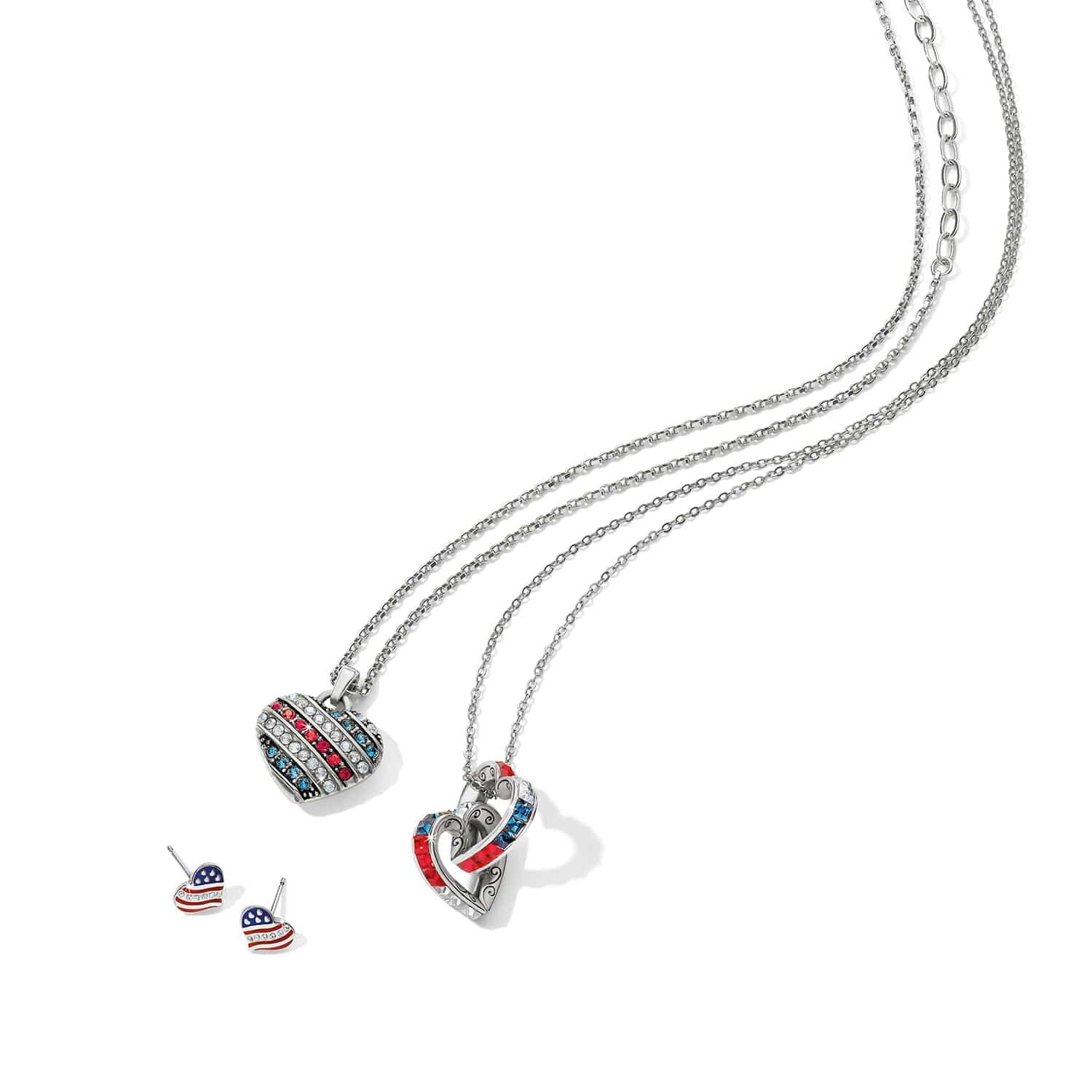 Brighton silver-plated heart necklaces and stud earrings styled with red, white, and blue crystals on white background