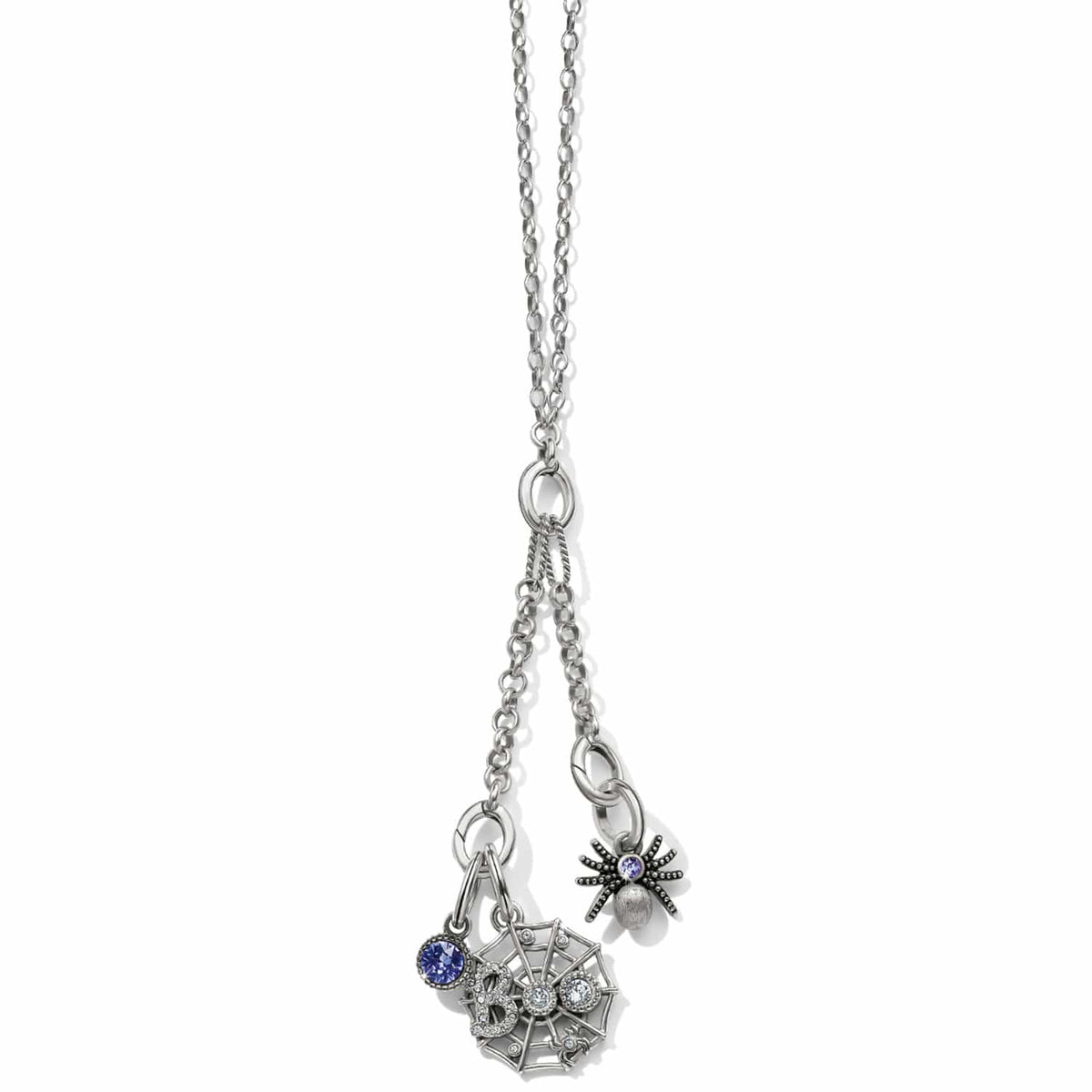 Brighton silver-plated charm necklace with spider, spiderweb, and blue crystal charms on a white background