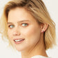 Model wearing a Brighton silver-plated ladybug stud earring with red and black enamel detailing