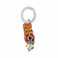 Brighton squirrel charm with brown enamel finish, silver-plated ring, and champagne crystal acorn accent on a white background