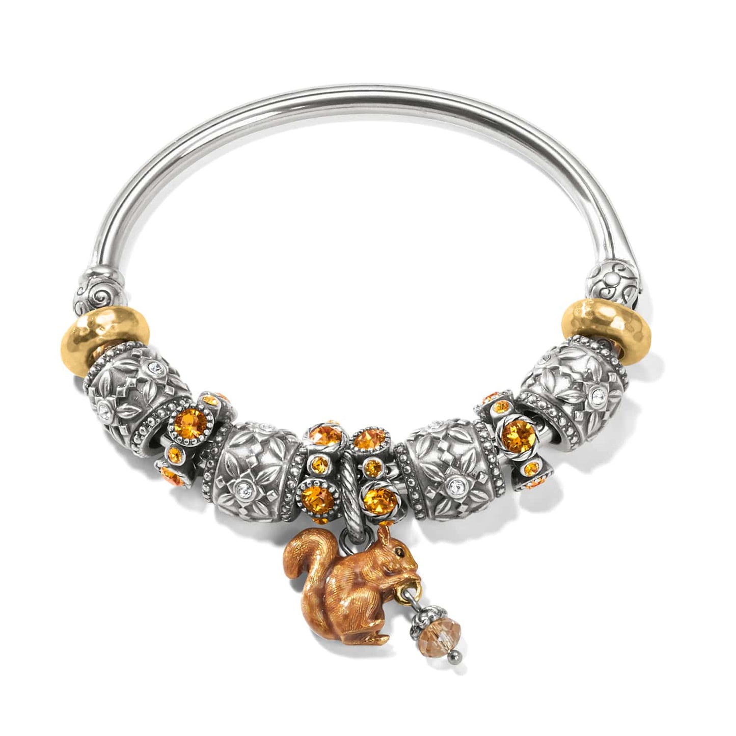 Brighton silver-plated bangle bracelet with ornate beads, amber crystals, and enamel squirrel charm on a white background